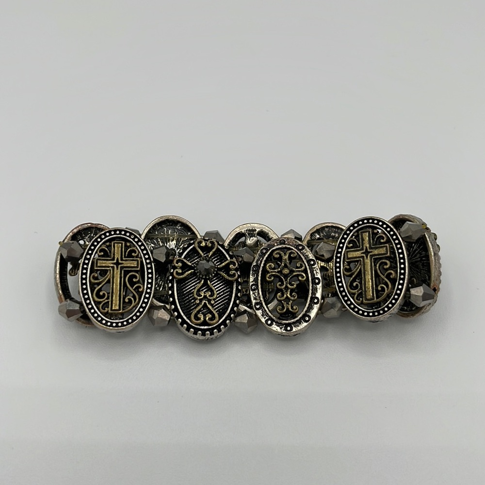 Dark metal bracelet with cross designs